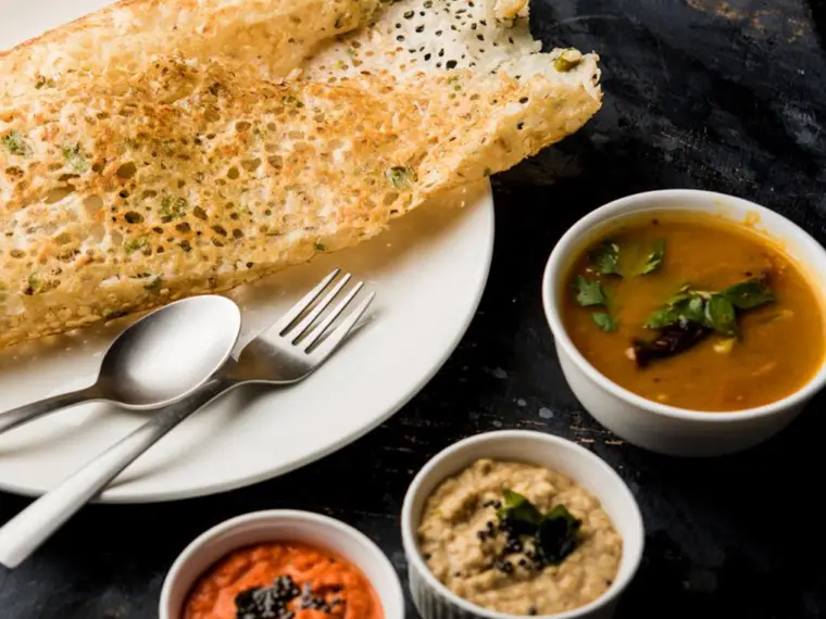 Rava dosa with sambhar and chutneys